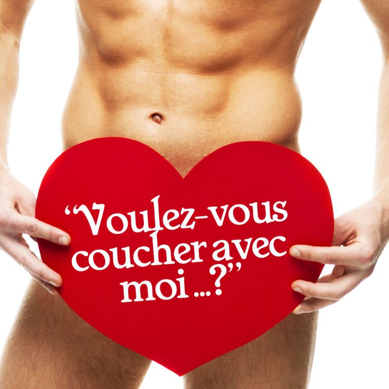 naked man holding big red paper heart naked man holding big red paper heart